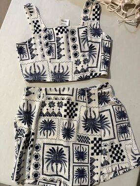 Monteau White and Navy Palm Print Two-Piece Crop Top and Skort Set
